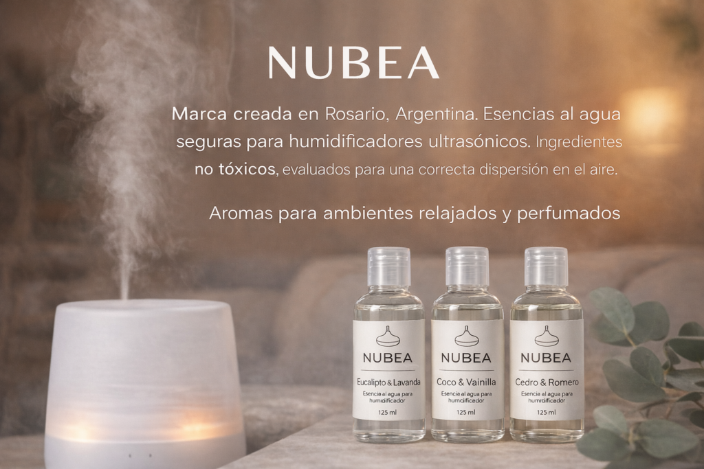 Esencias al agua NUBEA para humidificadores ultrasónicos en frascos transparentes, con tapa transparente, junto a humidificador en ambiente cálido
